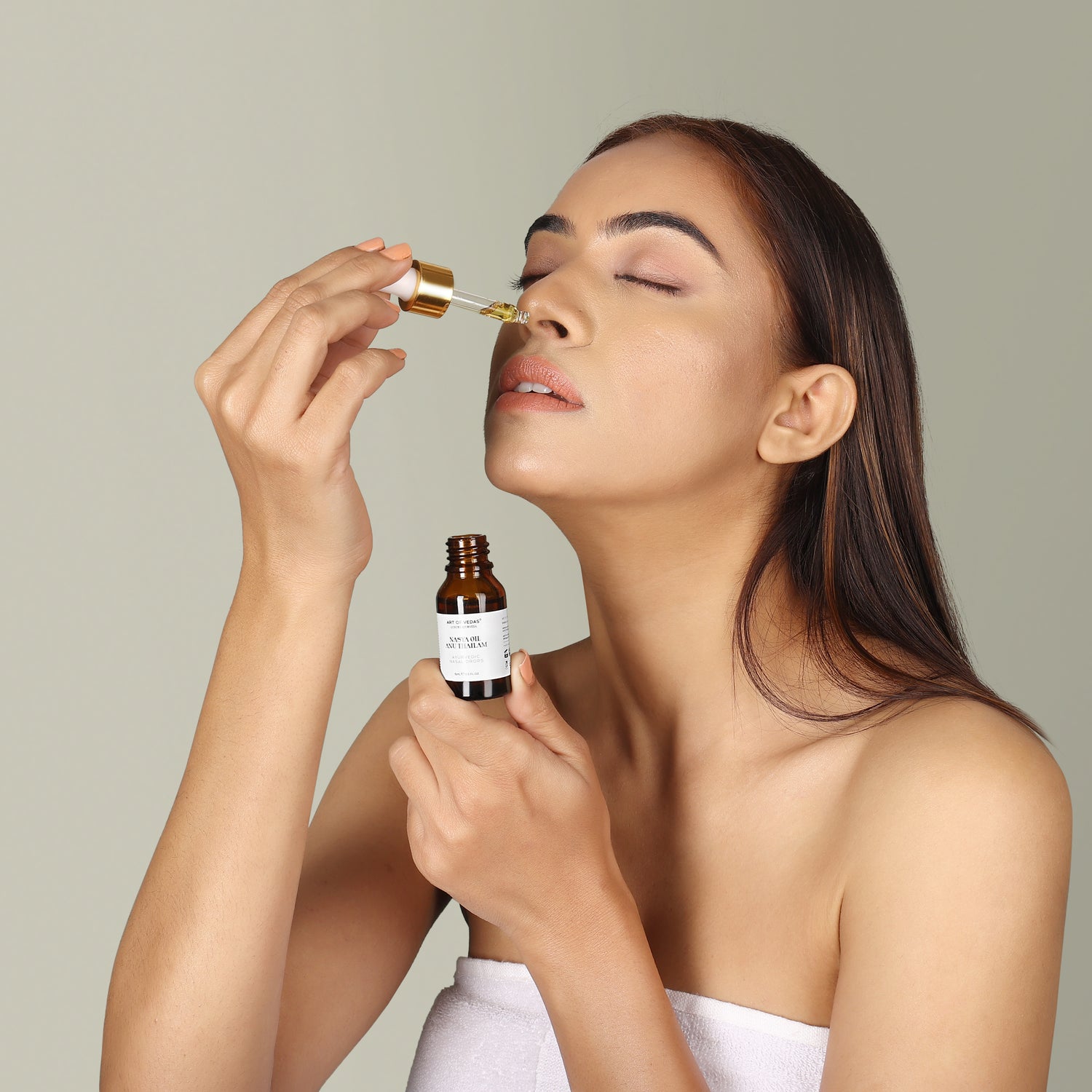 Art of Vedas Ayurvedic Nasal Care - Woman practicing Nasya therapy